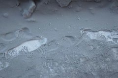 Вслед за "желтым снегом" и "белым порошком" в Омске уже дважды за неделю выпали осадки в виде "черного снега"